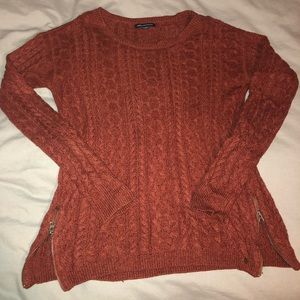 Orange long-sleeve knitted sweater with zippers